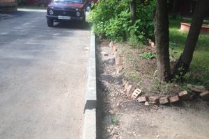 Великолучанка пожаловалась губернатору на новый асфальт во дворе (ФОТО)