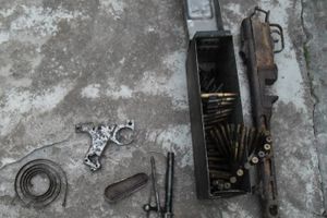 В Невеле у местного жителя полицейские изъяли пулемет, пистолет и другие боеприпасы 